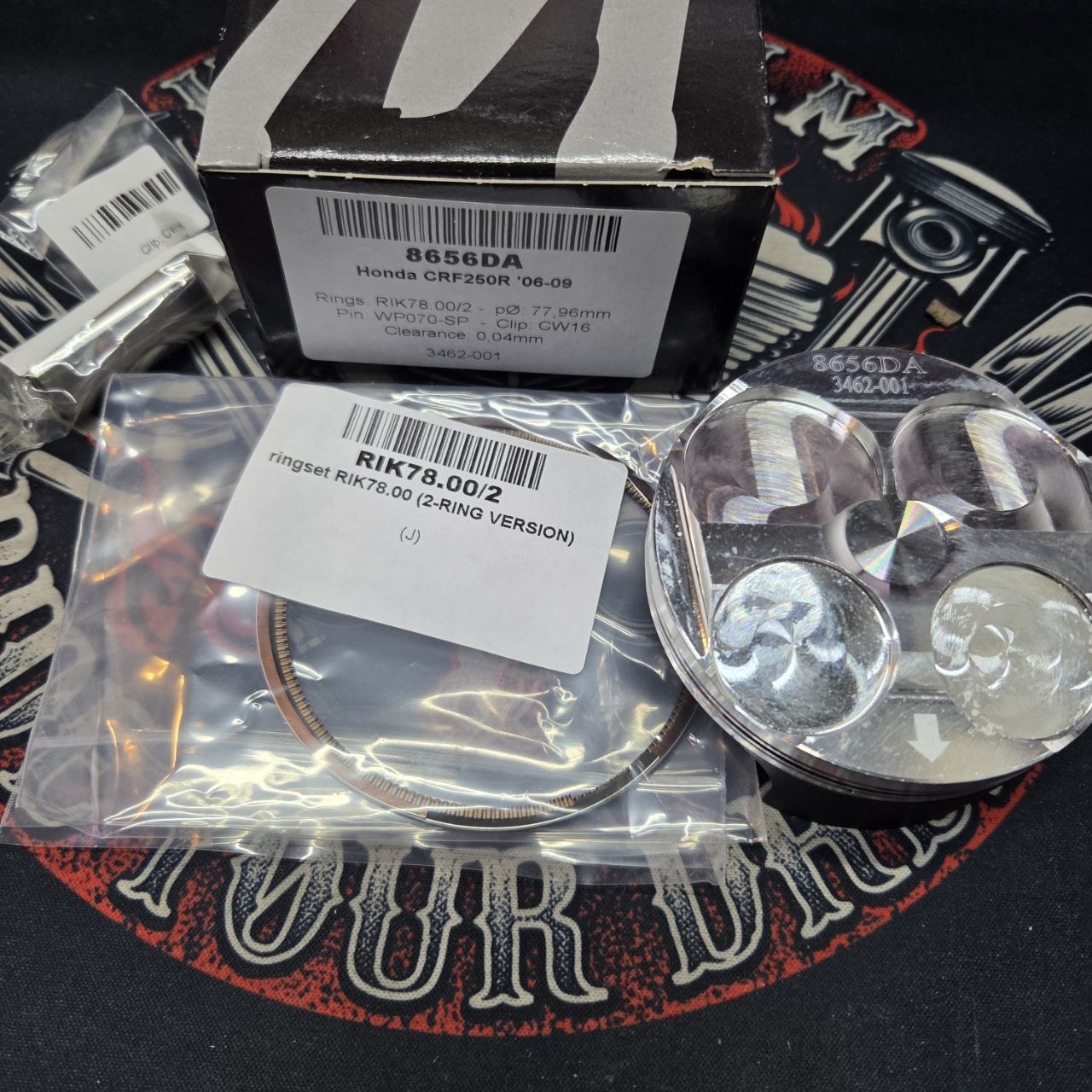 51ca0da8a5e0a9d7aca45192d6f45897.jpg Поршень Wossner Honda 8656DA CRF 250R 06-09/CRF 250X 04-17 (13.5:1) 77,96mm