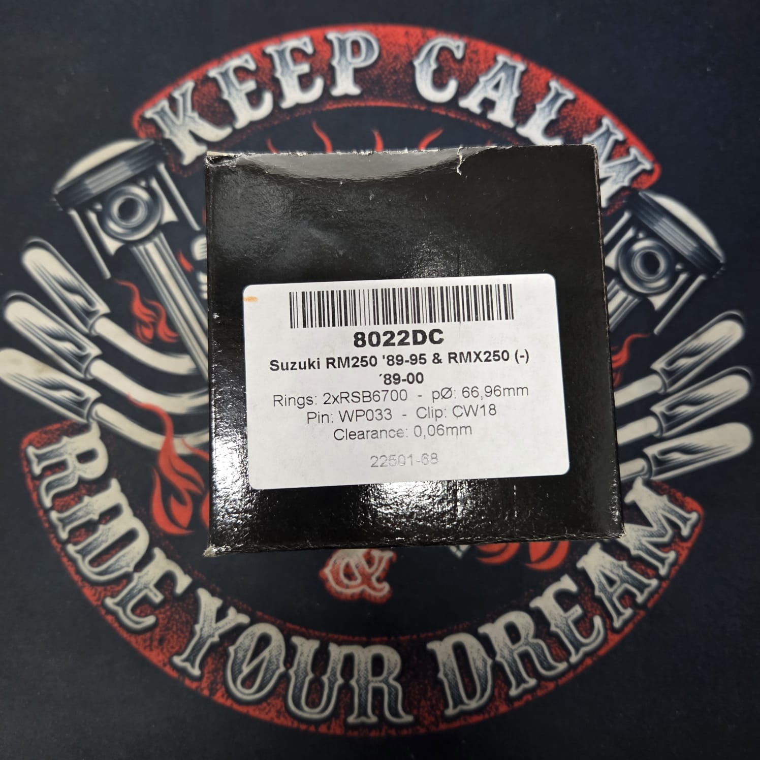 fcd2be4b4bb7af58f0444ab54a496963.jpg Поршень Wossner 8022DC Suzuki RM 250 87-95, RMX 250 89-99 66,96mm